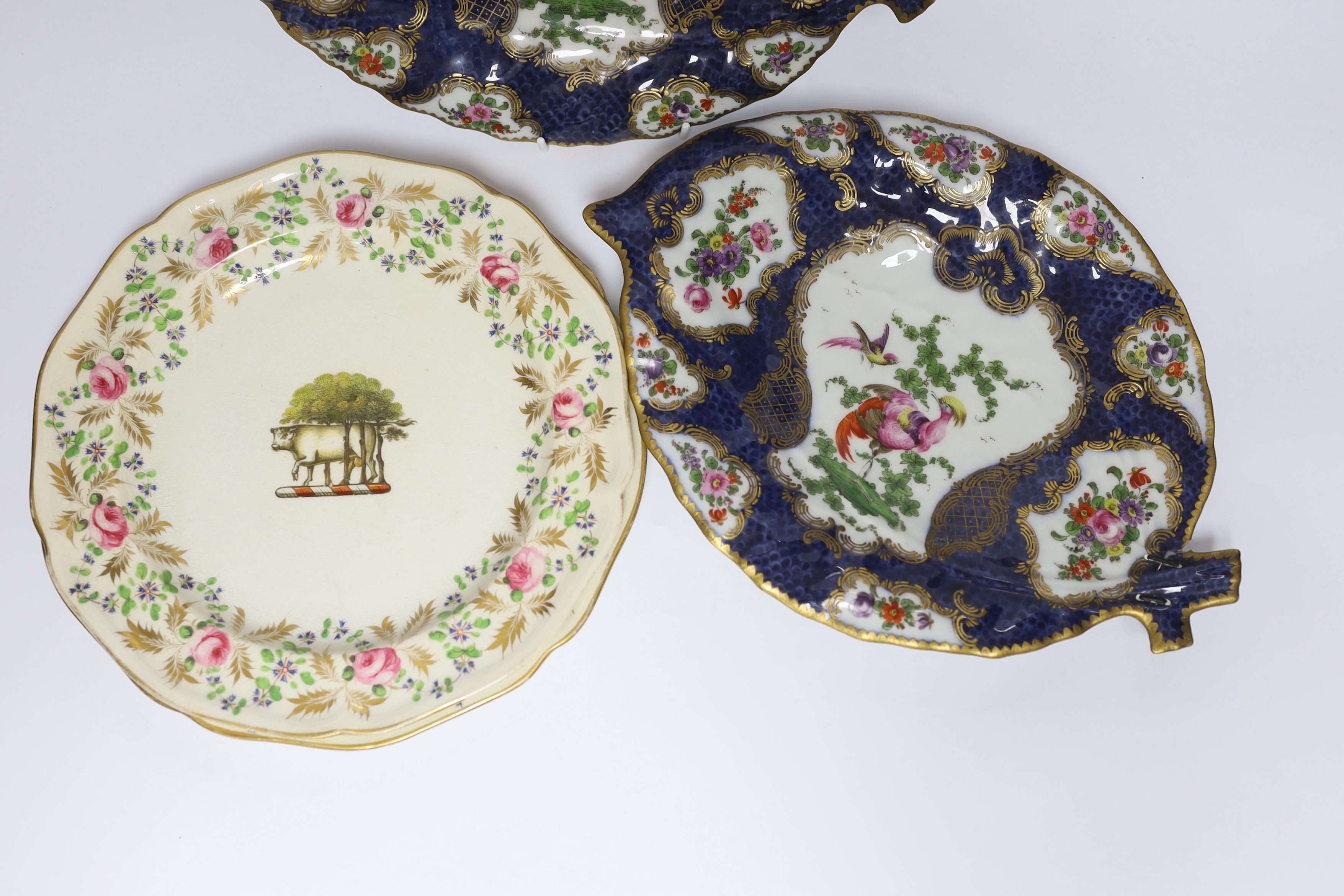 A pair of Samson Worcester style scale blue dishes, a Worcester fruit painted tea bowl and saucer, c.1780 and another teabowl together with a pair of Derby armorial plates, c.1820 and two jugs